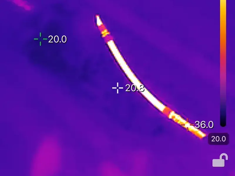 Thermal imaging camera scan showing underground pipe leak