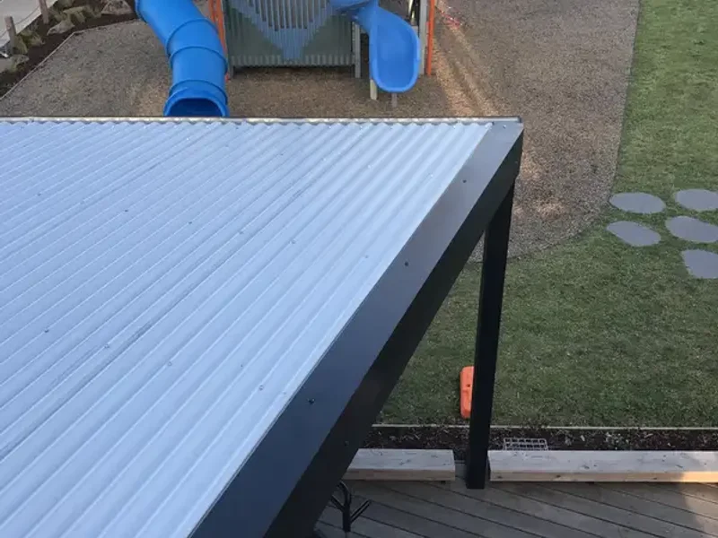 Roofing work near playground